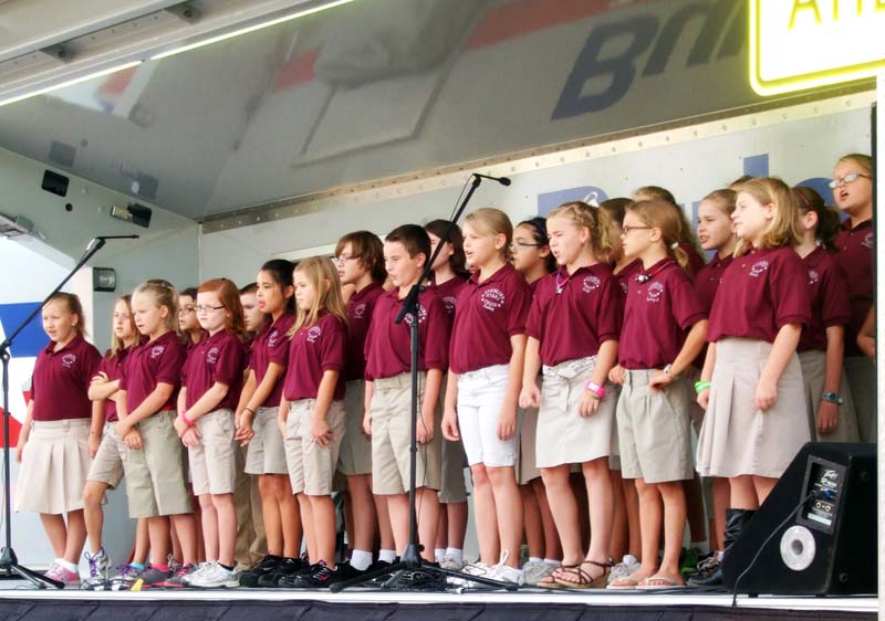 photo of children singing